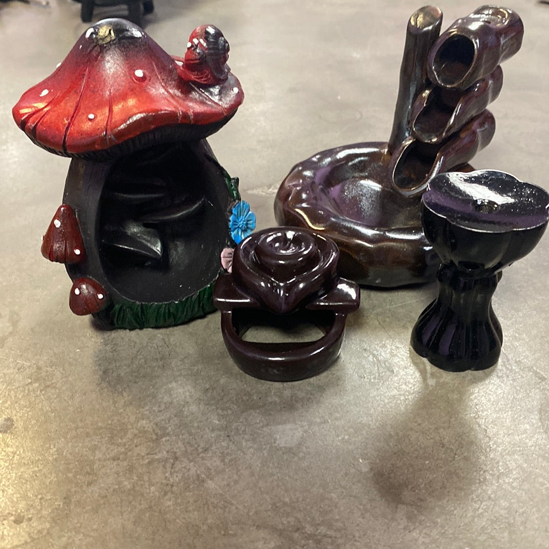 Backflow Burners in shape of mushroom.