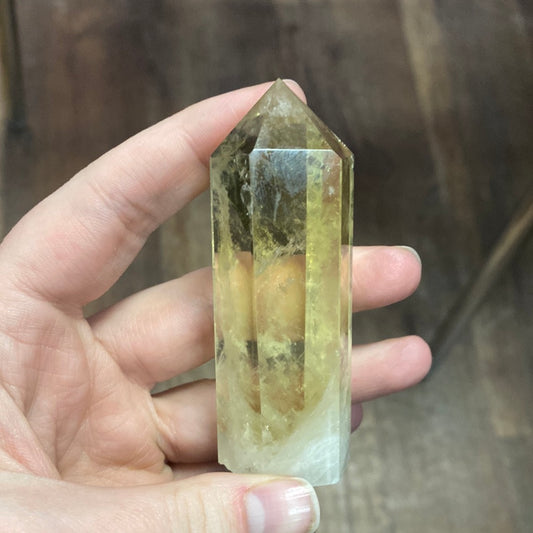 Citrine point in hand. 