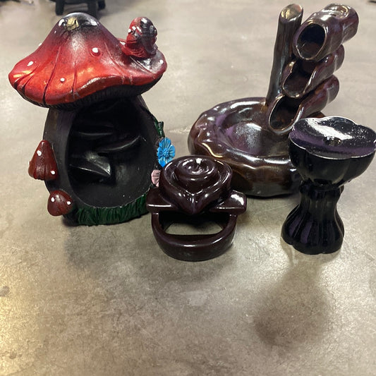 Backflow Burners in shape of mushroom. 
