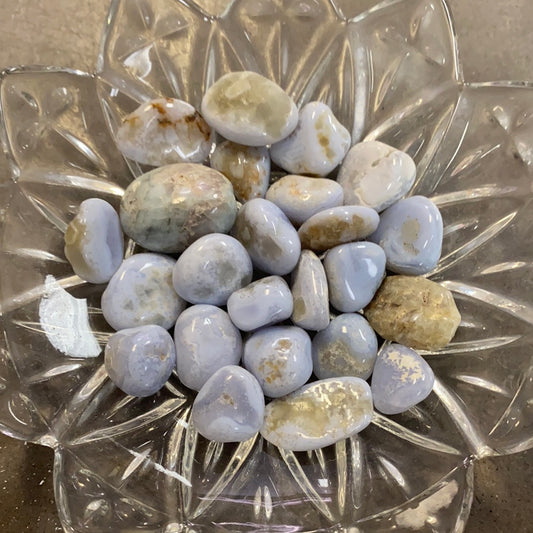Bowl of blue lace agate tumbles. 